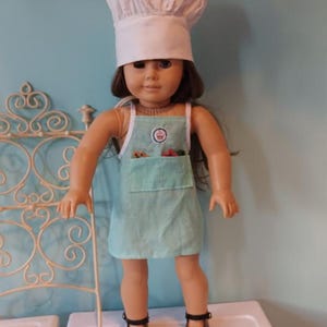 18 Inch Doll Clothes 3 piece baking set - included in the listing are - seafoam green apron. white chef hat and doll- size cookie cutters