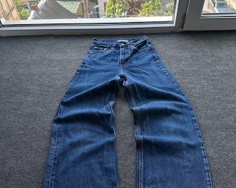 Jeans Levi's holgados de mezclilla azul para mujer.