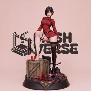 May include: A collectible figurine of a character with short black hair wearing a red long-sleeved top and black thigh-high boots. The figure stands on a wooden crate with red shotgun shells, holding a handgun, with a black logo in the background.