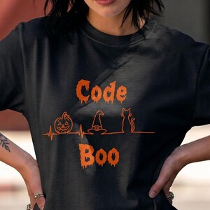 Avslappnad t-shirt med puls och Halloween-motiv för kvinnor