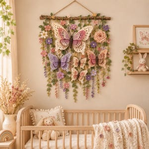 May include: A wall hanging featuring multiple crocheted butterflies in shades of pink, purple, and cream, suspended from a wooden branch with cascading green vines and small crocheted flowers in various colors, creating a floral display.