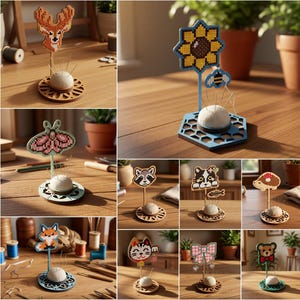 May include: A collection of ten laser-cut wooden pin cushions featuring various pixel-art style toppers including a deer, sunflower, moth, raccoon, cat, hedgehog, fox, lucky cat, bow, and bear. Each stand includes a white fabric cushion for needles.