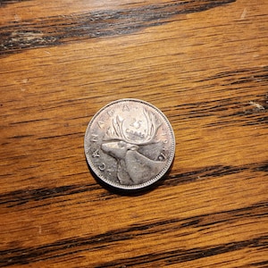 1957 ML Canada 25 Cent   SILVER  UNC