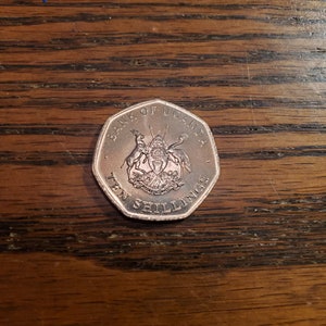 1987 Uganda 10 xelins UNC *inv
