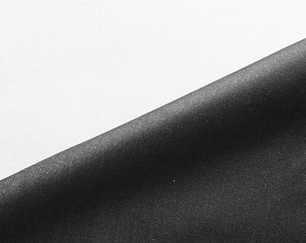 Entretela termoadhesiva termoadhesiva de algodón 100 % de peso medio, color negro o blanco, de 112 cm de ancho. Se vende por metro o medio metro.
