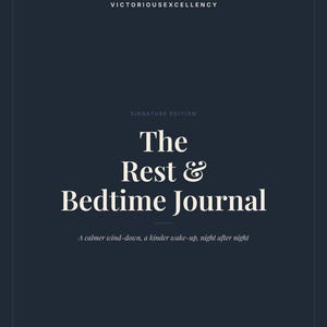 May include: A dark navy blue journal cover with white text reading VICTORIOUSEXCELLENCY, SIGNATURE EDITION, The Rest & Bedtime Journal, A calmer wind-down, a kinder wake-up, night after night, UNDATED EDITION, US LETTER, CRAFTED WITH QUIET INTENTION.