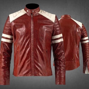 May include: A dark red leather jacket featuring a stand-up collar with a snap button, a full-length front zipper, and white leather panels on the shoulders and upper sleeves. The sleeves include two horizontal white stripes and quilted detailing.