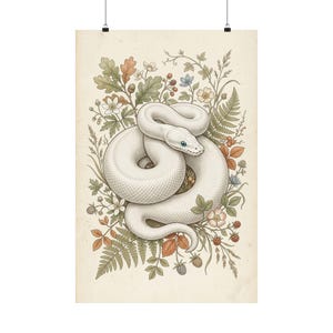 May include: A vertical wall art print featuring a coiled white snake with blue eyes, surrounded by detailed botanical illustrations of oak leaves, ferns, small white flowers, and red berries on a light cream-coloured background.