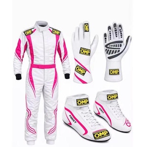 May include: A white racing suit with bright pink accents, a pair of white racing gloves with black palm grips, and a pair of white racing shoes with pink detailing. Each item features the yellow and black OMP logo and branding throughout the set.