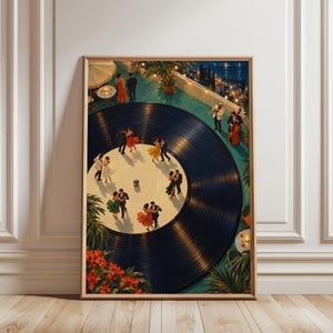 May include: A framed wall art print depicting a large black vinyl record serving as a dance floor on a terrace. Couples in formal attire dance on the white center label, while musicians play instruments nearby. The scene includes tropical plants and lights.