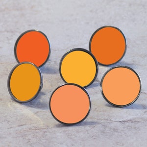Orange Cupboard Cabinet Door Knobs. Suitable for kitchen drawers. Bright colourful design. Suitable for all cabinets up to 25mm thick.