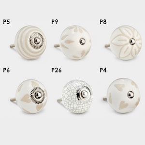 White Ceramic Cabinet Door Knob with Beige Patterns. Suitable for all cabinet doors