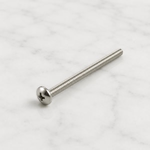 May include: A silver-colored metal machine screw featuring a rounded head with a cross-shaped Phillips drive recess and a long, fully threaded cylindrical shank. The fastener has a smooth, metallic finish and a uniform, consistent thread pattern.
