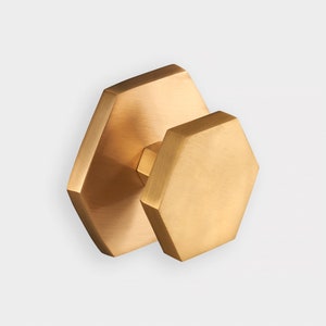 Brass Gold Hexagonal Centre Front Door Knob. Protective Lacquer to prevent tarnishing.