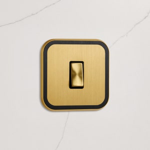 Gold Light Switch with Black Insert in 1G 2G 3G 4G Trailing Edge 240v 50hz. Premium Rocker Switch. CE Tested and Certified