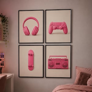 May include: A set of four framed wall art prints featuring monochromatic pink objects on a light background: a pair of over-ear headphones, a video game controller, a skateboard, and a portable cassette boombox player.
