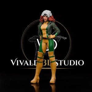 May include: A collectible figurine of a character with red hair and a white streak, wearing a green jacket, a yellow and green bodysuit, and tan over-the-knee boots. The character has hands on hips and stands against a black background with the text VIVALDI 3D STUDIO.