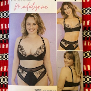 May include: Simplicity sewing pattern number S9833 for a Madalynne lingerie set. The pattern includes instructions for a bra and high-waisted underwear with lace detailing. The pattern is designed and printed in the USA.