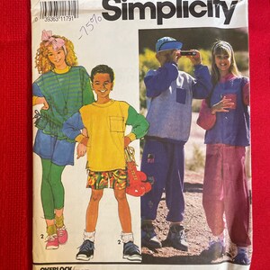 Vintage 1991 Simplicity Pattern 7528 Pantaloni o pantaloncini per ragazzi e ragazze e maglieria Felpe Taglia 7-10 UNCUT FACTORY PIEGATO