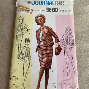 May include: A vintage sewing pattern for a plaid skirt and jacket set. The pattern is from Ladies' Home Journal and is styled exclusively for Sego diet food. The pattern is size 12, bust 32, and hip 34.