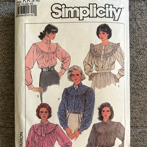 以下が含まれることがあります： Simplicityの縫製パターン番号8301は、女性のブラウス用です。このパターンには、フリル襟と長袖のブラウスが5つの異なるスタイルで含まれています。このパターンは、サイズ8〜14用です。