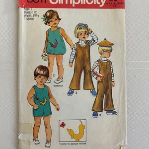 May include: Simplicity sewing pattern number 8811 for a toddler's jumpsuit and overalls. The pattern includes a transfer for applique. The pattern is for sizes 1, 2, and 3. The pattern is 65 cents in the U.S. and 75 cents in Canada.
