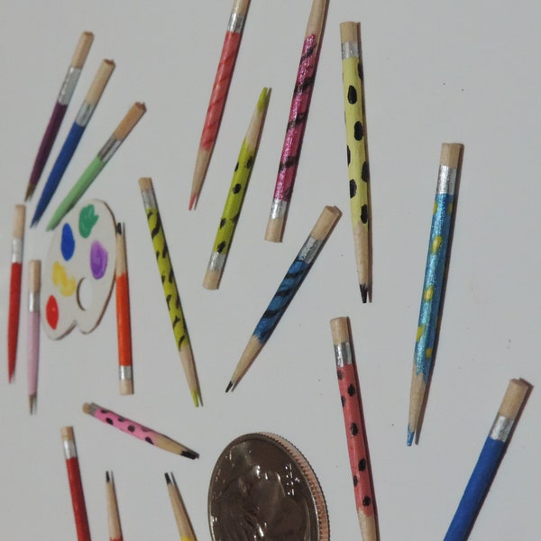 A child's Special Assorted Combination: Mini Pencils Color and Primary;  Paint brushes with paint board