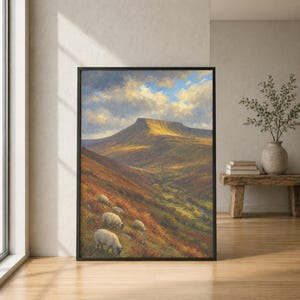 May include: A framed landscape painting depicting a large, flat-topped mountain under a cloudy blue and yellow sky. The foreground features a grassy hillside with four white sheep grazing, while a valley with a stream stretches toward the mountain.