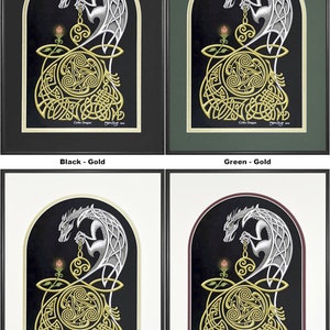 May include: A Celtic dragon design with intricate knotwork and a silver dragon holding a golden orb. The background is black and the design is framed in gold. The text "Celtic Dragon" is at the bottom of the image.