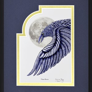 May include: Framed artwork featuring a detailed illustration of a blue raven with a full moon in the background. The raven's wing is outstretched, showcasing intricate feather details. The artwork is titled "Moon Raven" and is signed.