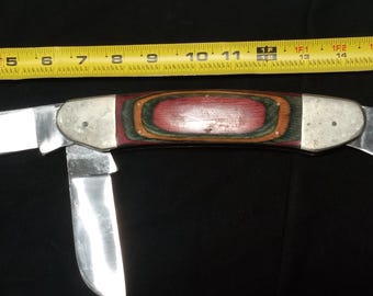 Il più grande coltellino tascabile del mondo, fatto a mano con 3 lame e manico in legno di cervo rosso Pakka