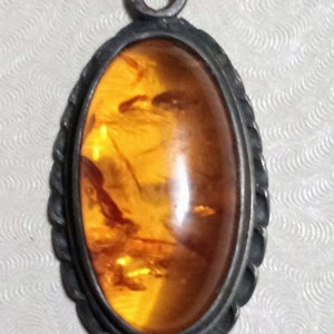 Vintage 1970s Handmade Finely Detailed Silver and Amber Pendant.
