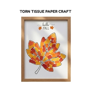 May include: A framed art piece titled TORN TISSUE PAPER CRAFT featuring a large maple leaf outline filled with small, irregular pieces of red, orange, and yellow tissue paper. Above the leaf, the text reads hello FALL with two small leaf icons.