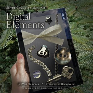 May include: A digital tablet screen displaying a collection of silver-toned graphic elements including a star, a cream-colored ribbon bow, a heart charm with the word Love, a rhinestone chain, a button, a metal key, and a small circular pin.