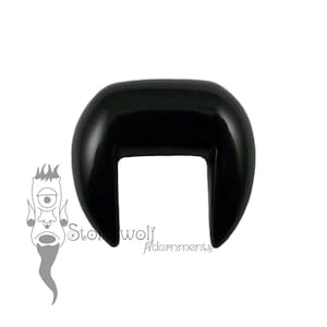 May include: Black acrylic single flared ear gauge with a U-shaped opening. The gauge is smooth and shiny.