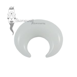 May include: White crescent shaped ear gauge made of acrylic.