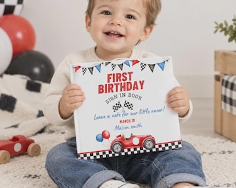 May include: A square hardback sign-in book with a white cover featuring red text that reads FIRST BIRTHDAY SIGN IN BOOK, blue text that reads Leave a note for our little racer!, the date MARCH.19, the name Maison smith, and a red race car.