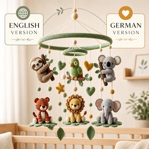 May include: A crochet baby mobile featuring a green circular frame with hanging yarn figures of a sloth, parrot, koala, tiger, lion, and elephant. The mobile includes small crocheted hearts, stars, and leaves suspended by white strings.