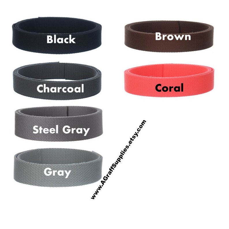 May include: Five different colors of webbing straps, including black, brown, charcoal, coral, steel gray, and gray. The straps are all the same width and are shown in a row.