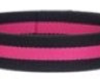 50 yard roll of 1.25 inch hot pink and black striped webbing.