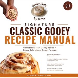 May include: A recipe manual titled Signature Classic Gooey Recipe Manual by Binta. The cover features a cinnamon roll on a plate and a close-up of a glazed roll. Text includes Complete Classic Gooey Recipe + Gooey Rolls Master Dough Formula.