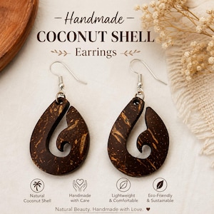 May include: A pair of dark brown coconut shell earrings with a teardrop-shaped hook design and silver-toned metal ear wires. The text on the image reads: Handmade COCONUT SHELL Earrings, Natural Coconut Shell, Handmade with Care, Lightweight & Comfortable, Eco-Friendly & Sustainable, Natural Beauty. Handmade with Love.