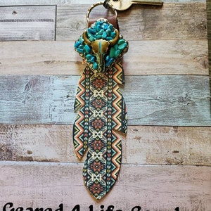 Feather and concho, purse charm, leather feather keychain, western accessories, saddle charm, saddle feather, saddle bling colorful print