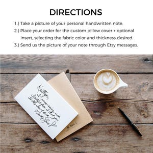 May include: A white card with a handwritten note that says "Kaitlyn, I miss seeing your beautiful face. I love you to the moon & back! Much Love ❤️". The card is on a brown envelope on a wooden surface. There is a cup of coffee with a heart design in the foam and a pen on the surface.