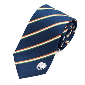May include: A navy blue tie with white, orange, and green stripes. The tie has an embroidered white elephant on the bottom.