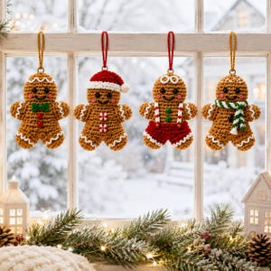May include: Four crocheted gingerbread ornaments hanging by gold strings. The first wears a green bow tie, the second a red and white Santa hat, the third red overalls with white straps, and the fourth a green and white striped scarf.