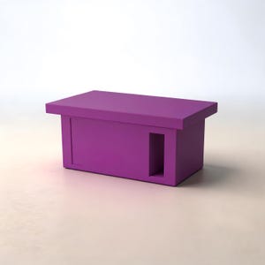 May include: A rectangular purple table with a flat top surface and a solid base. The front panel features a vertical rectangular cutout on the right side and a recessed rectangular panel on the left side, creating a clean and structured appearance.