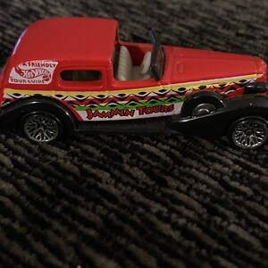 1999 MI Hot wheels 56 Ford genuine Ford parts car, hood opens