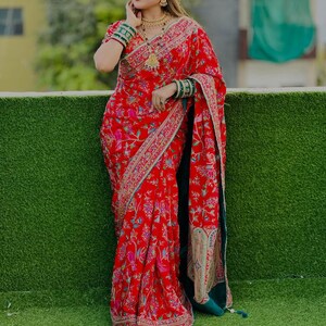 Red All-over  floral Threadwork saree with Embroidered blouse