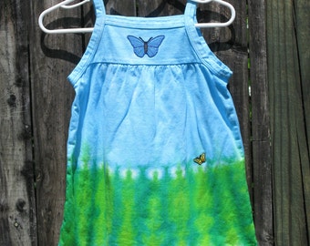 Infant sleeveless dress with butterflies